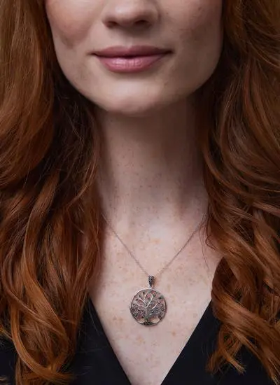 Close up shot of red haired model wearing Sterling Silver Marcasite Tree of Life Pendant